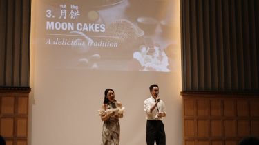 Li Junchi and Du Jiaxing deliver their presentation