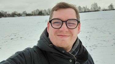 A selfie of Luke taken outside in the snow