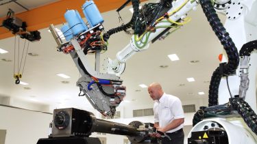 Manufacturing robot with man 