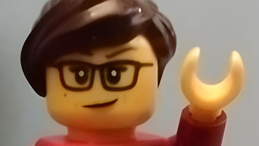 Image of LEGO Minifigure with short brown hair and glasses 