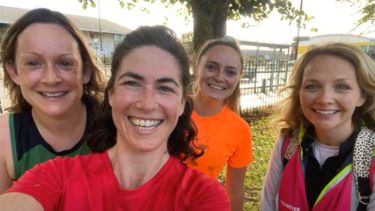 Caroline, Anna, Emily and Hannah pose for a selfie after finishing a ParkRun