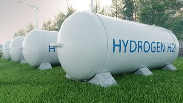 White cylinders with blue text saying hydrogen H2.