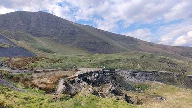 A view of Mam tor landslide, a large landslide in the peak district. View is from below and shows main scarp