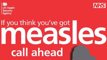 Poster advising patients to phone in advance of attending surgery if measles suspected