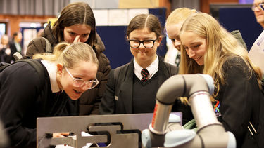 Group of girls interacting at STEM event