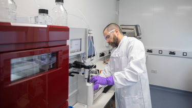 Toby Gamlen with the Akta Avant 150. A chromatography system used to purify the vector product after a bioreactor run.