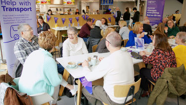 Patients, staff and friends from Weston Park Cancer Charity socialising in the Wave Kitchen