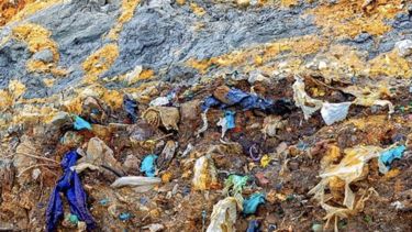 Buried, decomposing waste and plastics