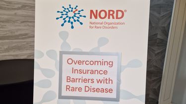 Poster reads: NORD - Overcoming Insurance Barriers with Rare Disease