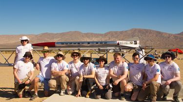 Students from Project Sunride stood in front of their rocket - Desert Winds
