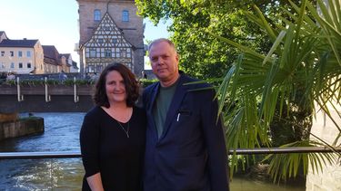 Henk de Berg and  with Prof. Claudia Lillge" posing by a river in Erlangen-Nurnberg