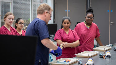 Dr Duncan Wood teaching students in the Dental Technology Unit