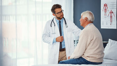 Older male patient and doctor consultation 