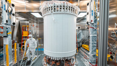 LZ’s central detector, the time projection chamber, in a surface lab clean room before delivery underground. Credit: Matthew Kapust/Sanford Underground Research Facility