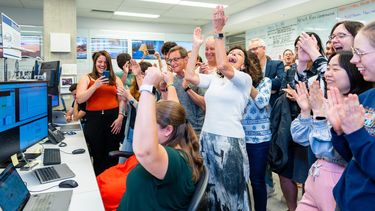 The Short-Baseline Neutrino Detector collaboration celebrated the moment the detector began running at 100% voltage. Credit: Dan Svoboda, Fermilab