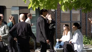 Attendees of the FSN conference network in our courtyard