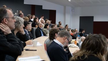 Lecture theatre full of engaged attendees