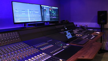 A MIXING DESK IN A RECORING STUDIO