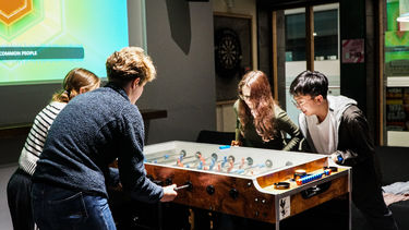 Students play table football at Edge Bar Endcliffe 