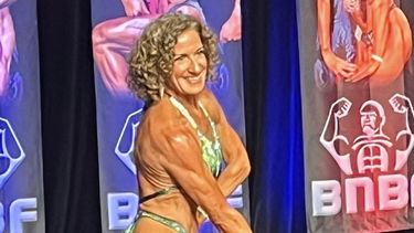 Professor Suzanne Mason competing at a body building competition