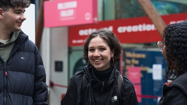 student smiling at camera