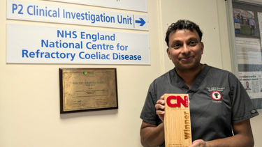 Professor David Sanders from Sheffield Gastroenterology holding an award