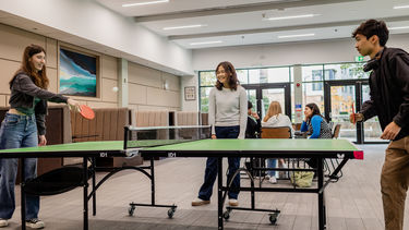 Students playing ping pong at the Ridge