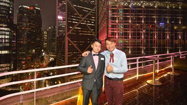 Two Sheffield alumni smiling to the camera at the Hong Kong alumni event.