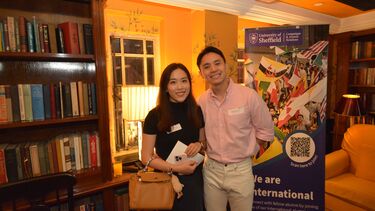 Two Sheffield alumni smiling to the camera at the Hong Kong alumni event.