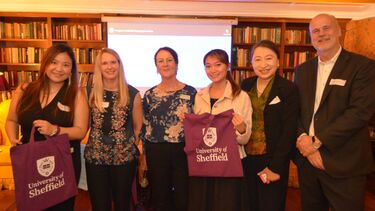 Sheffield alumni raffle winners at the Hong Kong alumni event.