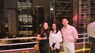 Sheffield alumni smiling to the camera at the Hong Kong alumni event.