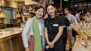 Sheffield alumnae smiling at the camera at the Singapore alumni event.