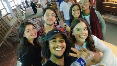A group of people smiling