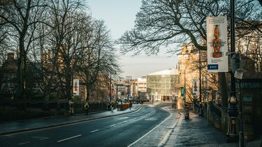 An urban view with a road and offices