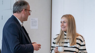 Two people networking.