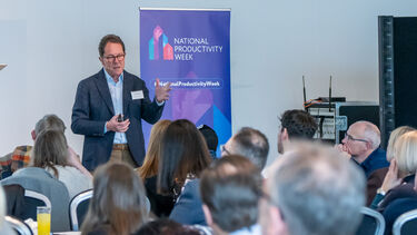Peter Cheese delivering a presentation.