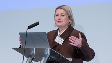 A woman presenting.