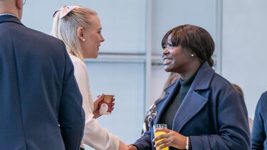 Two people shaking hands.