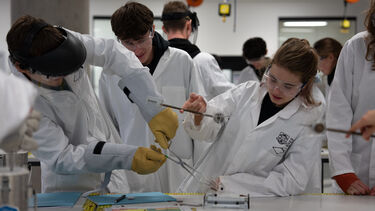 Engineering students in the Structures Lab