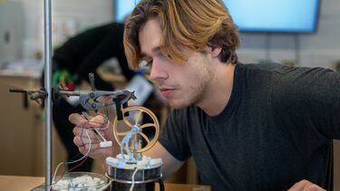 Student in engine making lab session