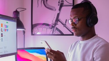 Photo of a student distracted by their phone