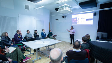 group of people in a room during workshop