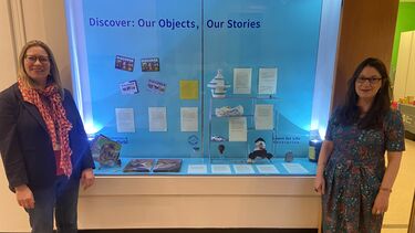 Display case showing objects from the Discover course