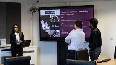Students presenting to clients in the Marketing Consultancy Challenge.