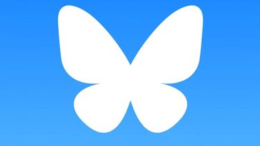 Logo for Bluesky, a blue circle with a white butterfly