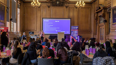 Full room in mappin hall looking at speaker on stage