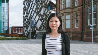 Ling Min Tan stood in front of The Diamond building