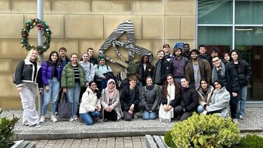 A group of students pose at Astra Zeneca