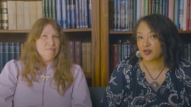 Yinka Olusoga and Catherine Bannister seated in front of a bookcase
