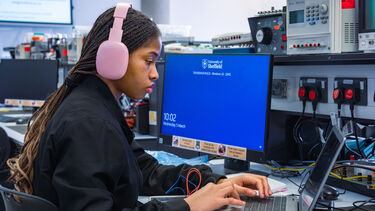 girls student coding in lab